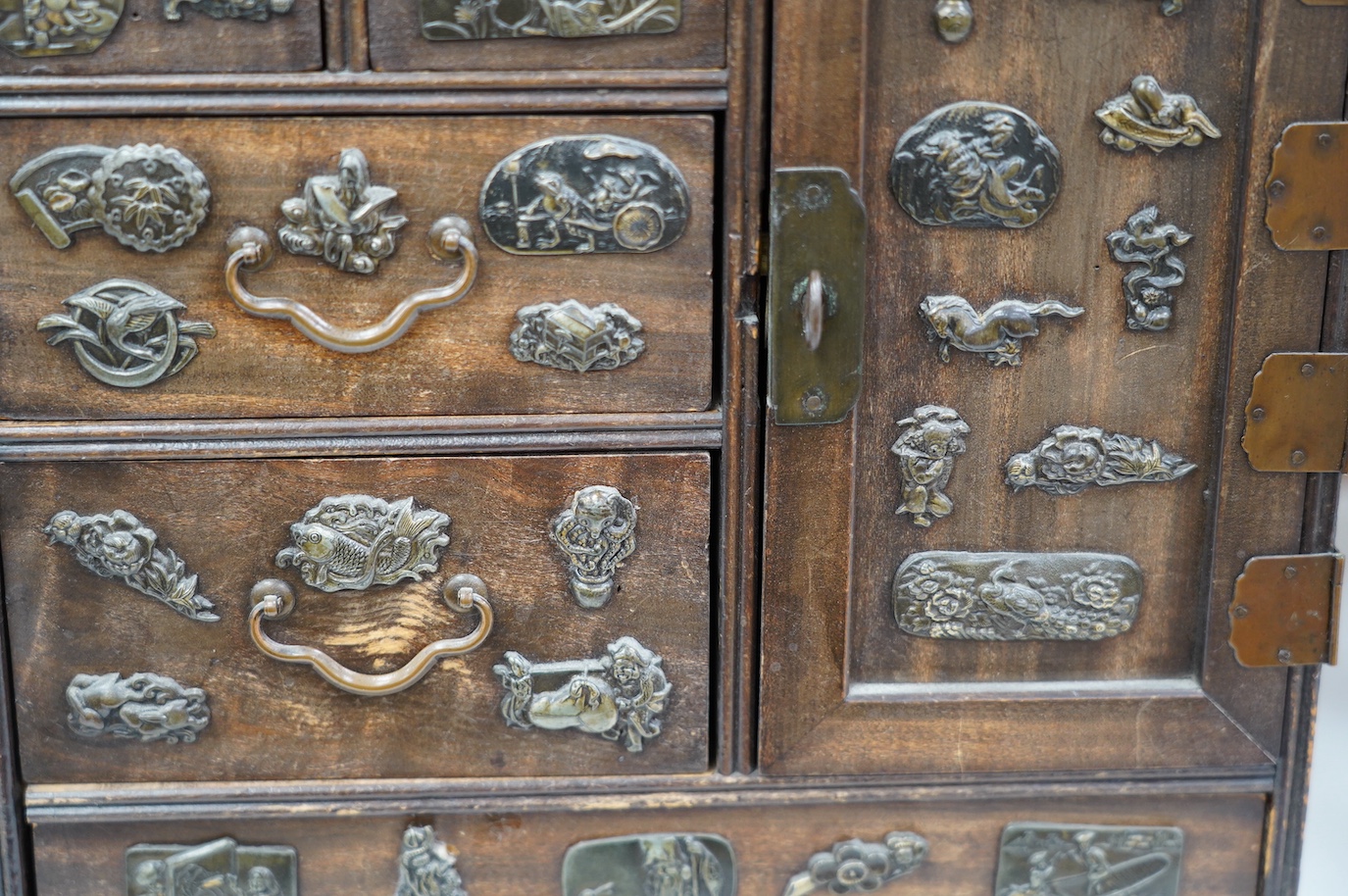 A late 19th century Japanese desk top dansu cabinet, 33.5x 29cm. Condition - fair